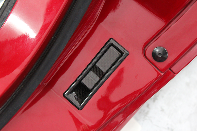 Carbon fiber Alfa Romeo 4C trunk release handle
